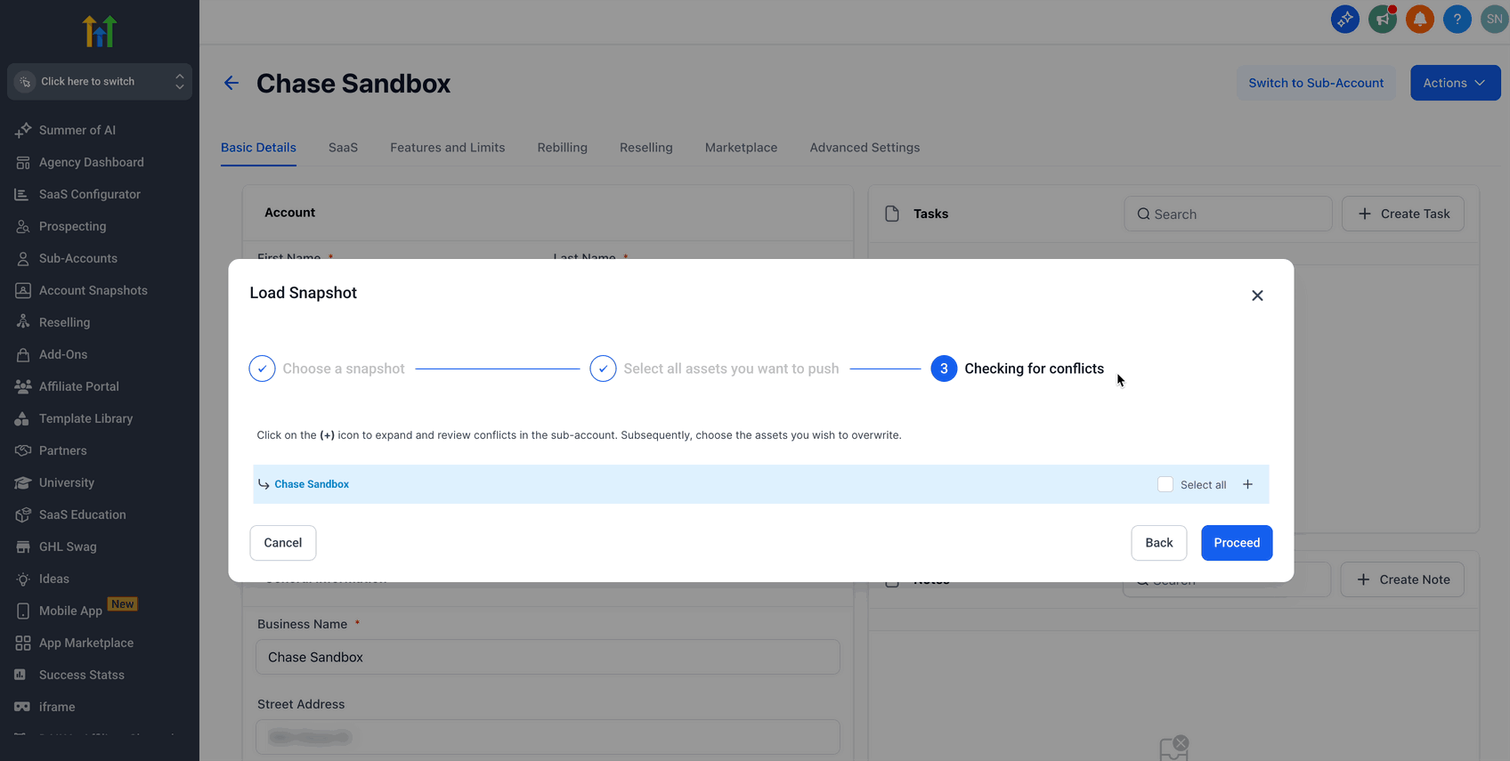 Animated GIF demonstrating the final confirmation step for loading a GoHighLevel snapshot, including typing 'Confirm' into a box and clicking 'Proceed' to start the deployment.