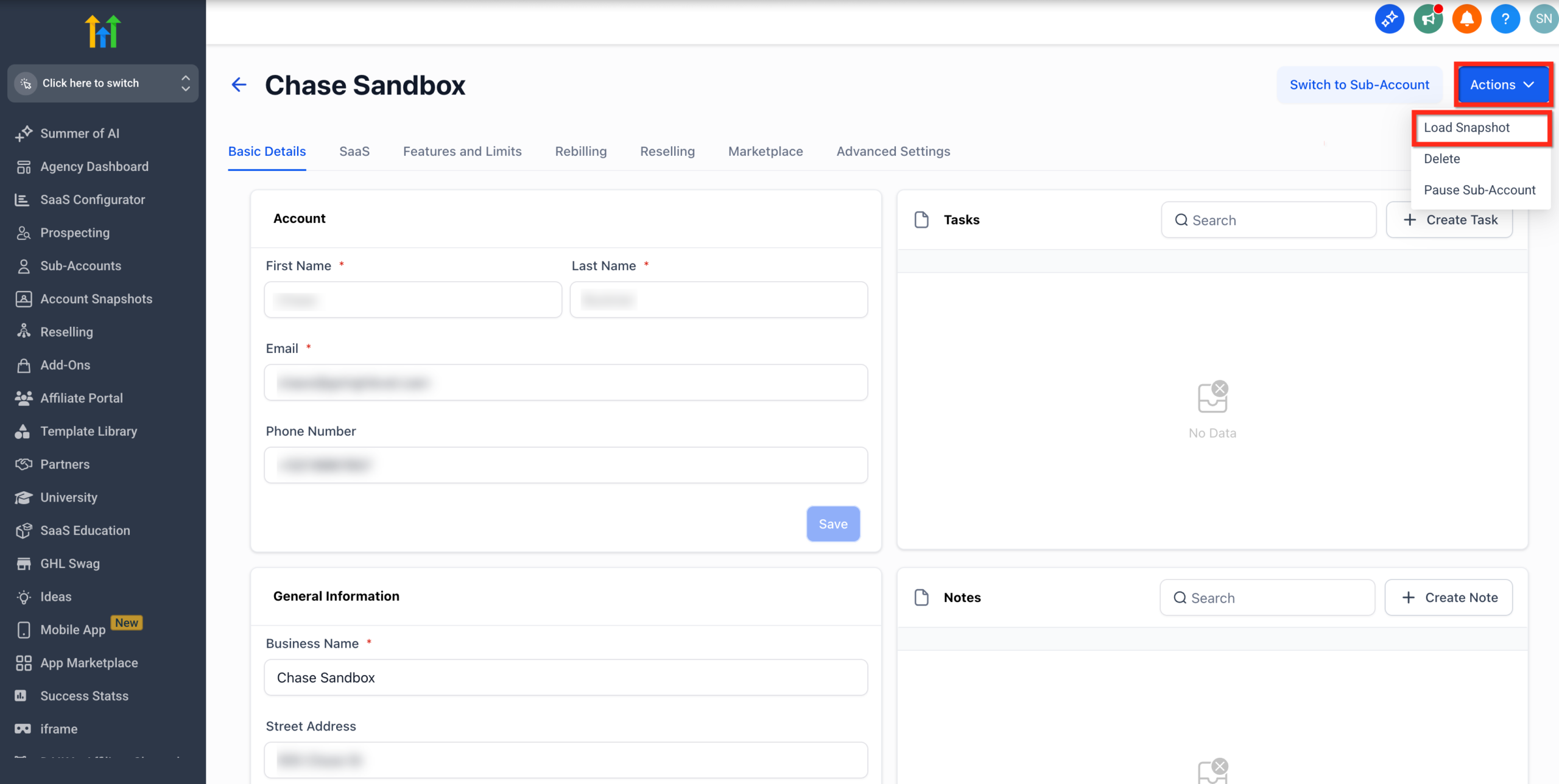 Screenshot illustrating the 'Load Snapshot' option chosen from the 'Actions' dropdown menu on a GoHighLevel client management page.