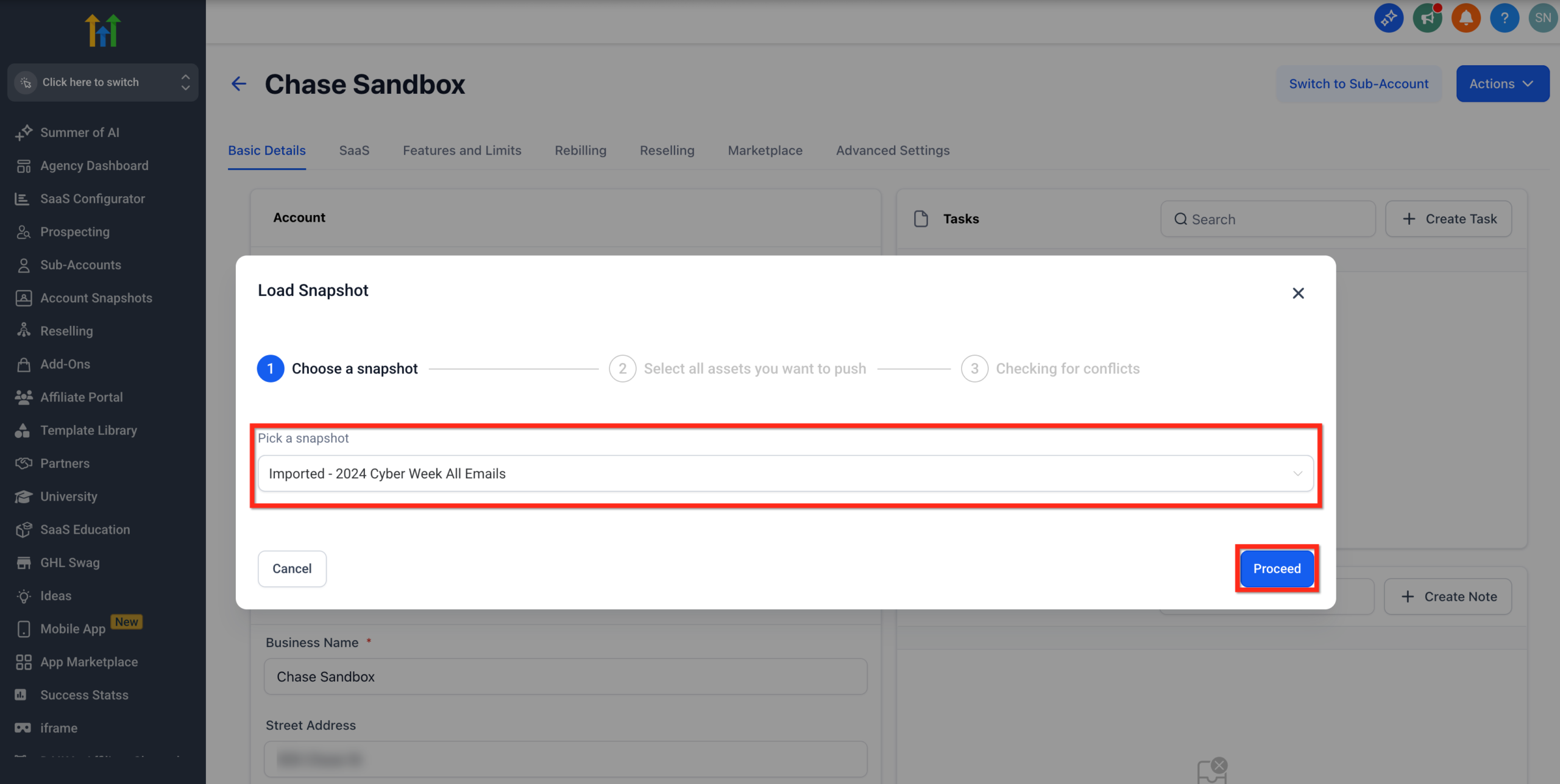 Screenshot of the GoHighLevel 'Load Snapshot' wizard, displaying a dropdown to select an imported snapshot and a 'Proceed' button to continue.